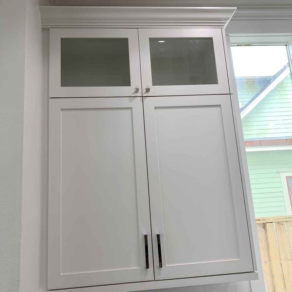 A simple white shelves in kitchen area