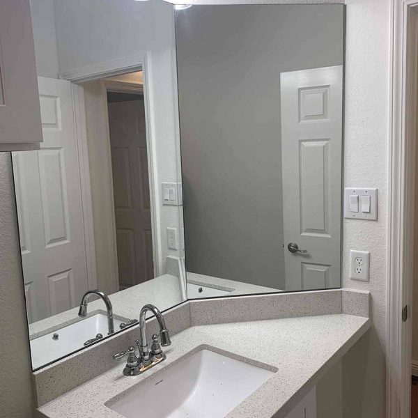 A huge mirror in dress up area