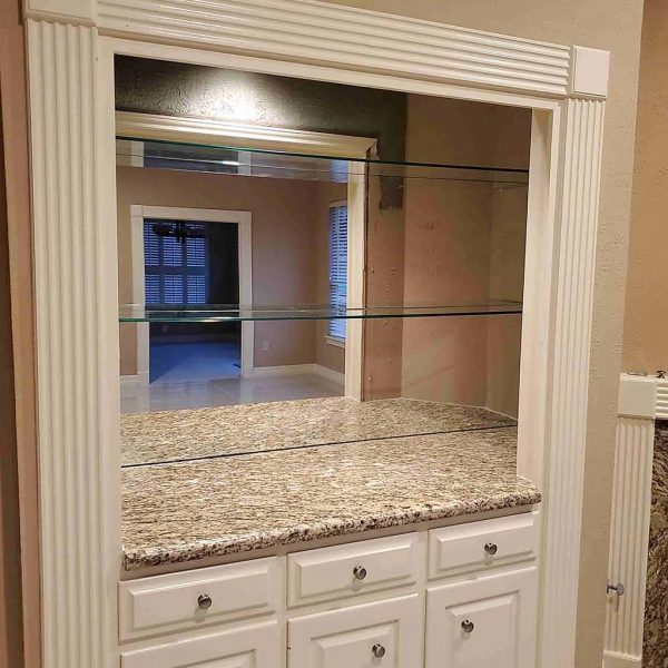 A huge mirror for the dress up room